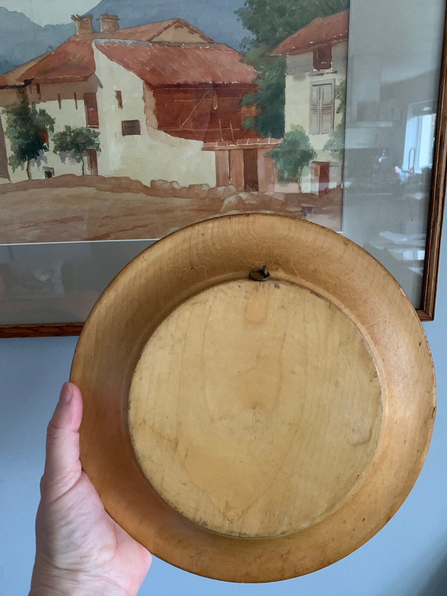 Vintage, handmade wooden wall hanging plate.