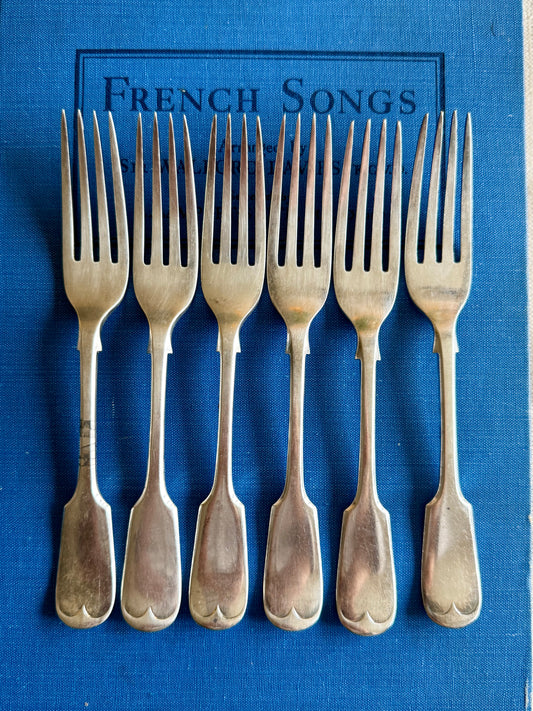 Antique silver plated cake forks.