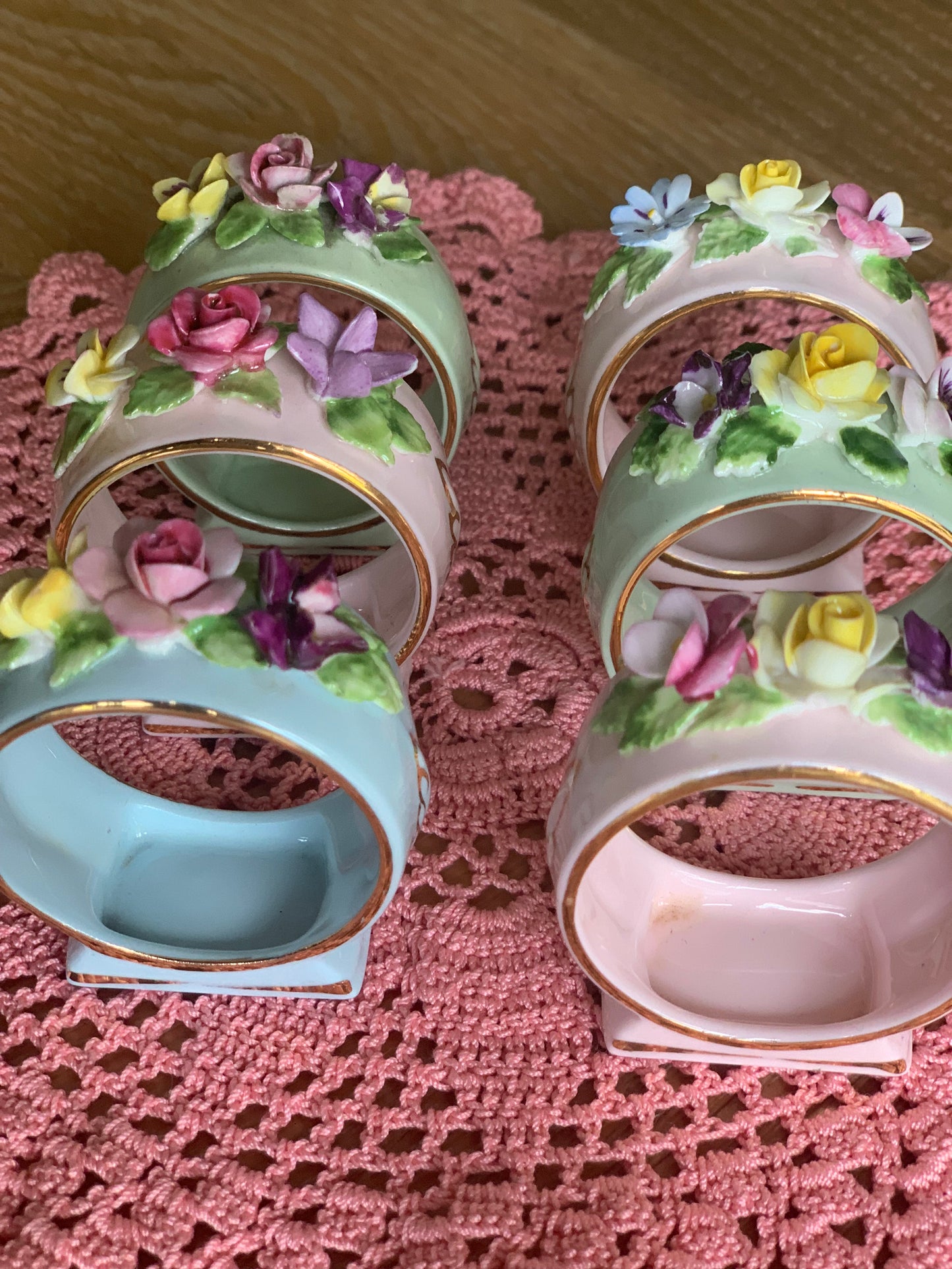 Antique, last century fine bone china, floral napkin rings.