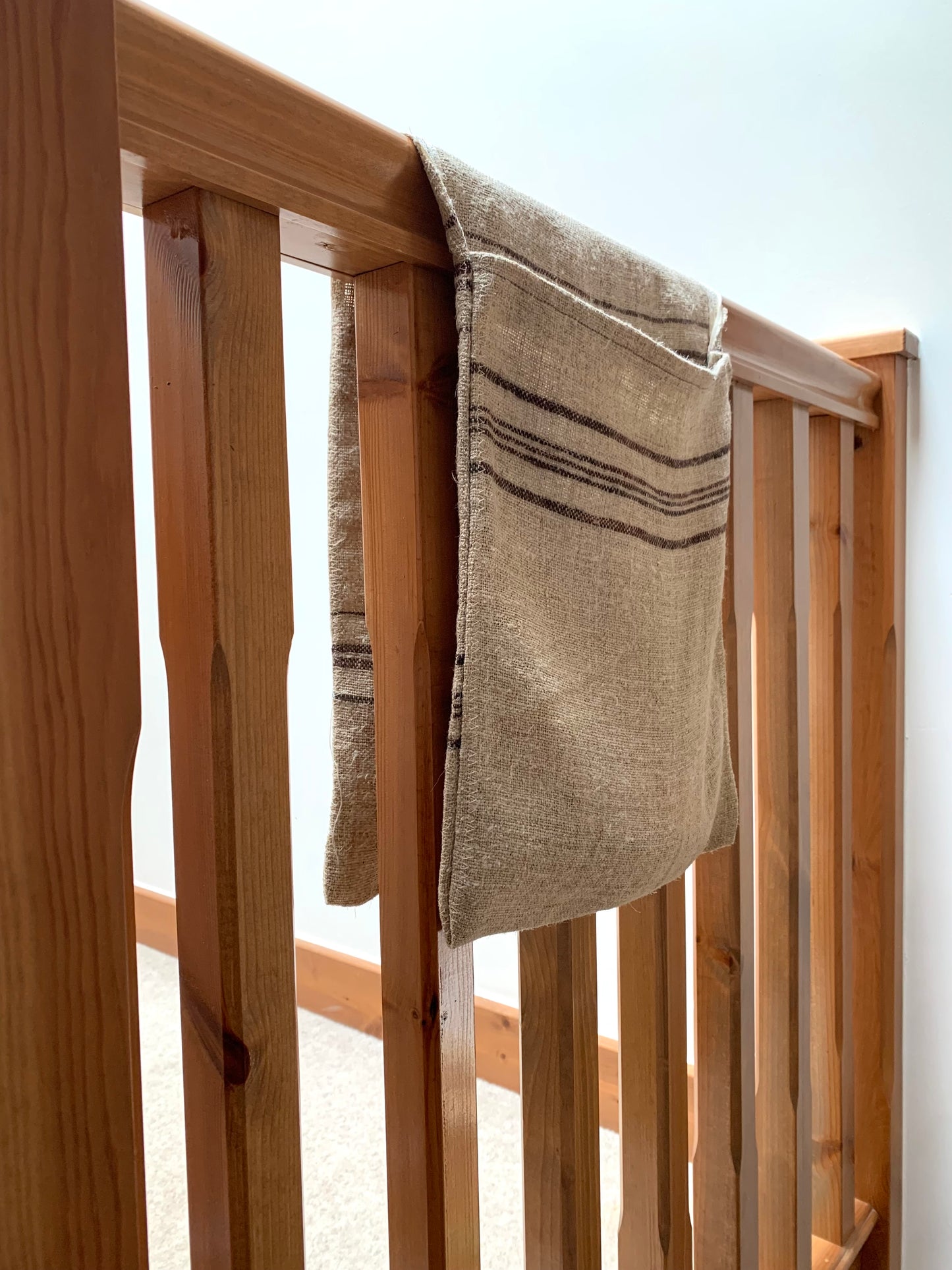 Antique, handwoven hemp stair organiser.