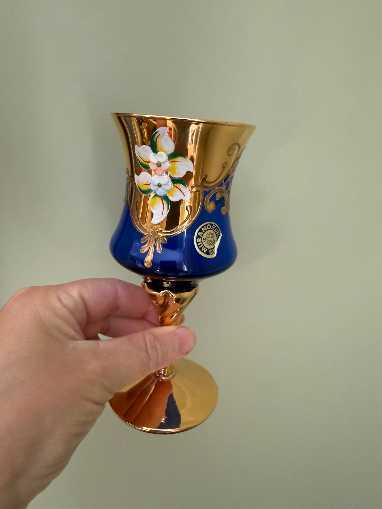 Set of 4 Murano cobalt blue and gold Venetian glass goblets with enamel floral decoration.