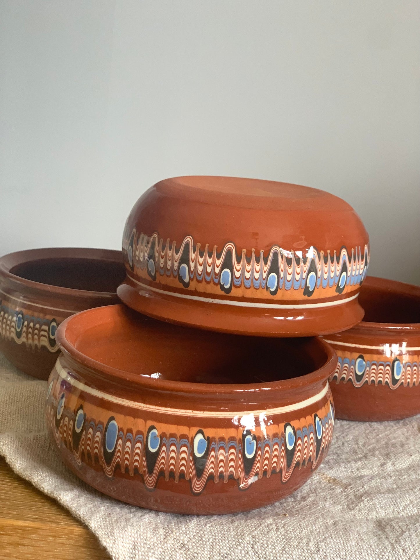 Set of four handmade, ceramic bowls.