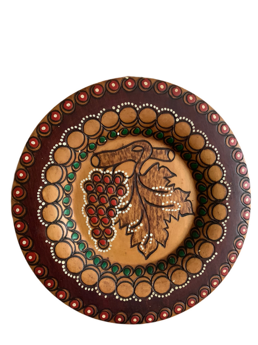 Vintage, handmade wooden wall hanging plate.