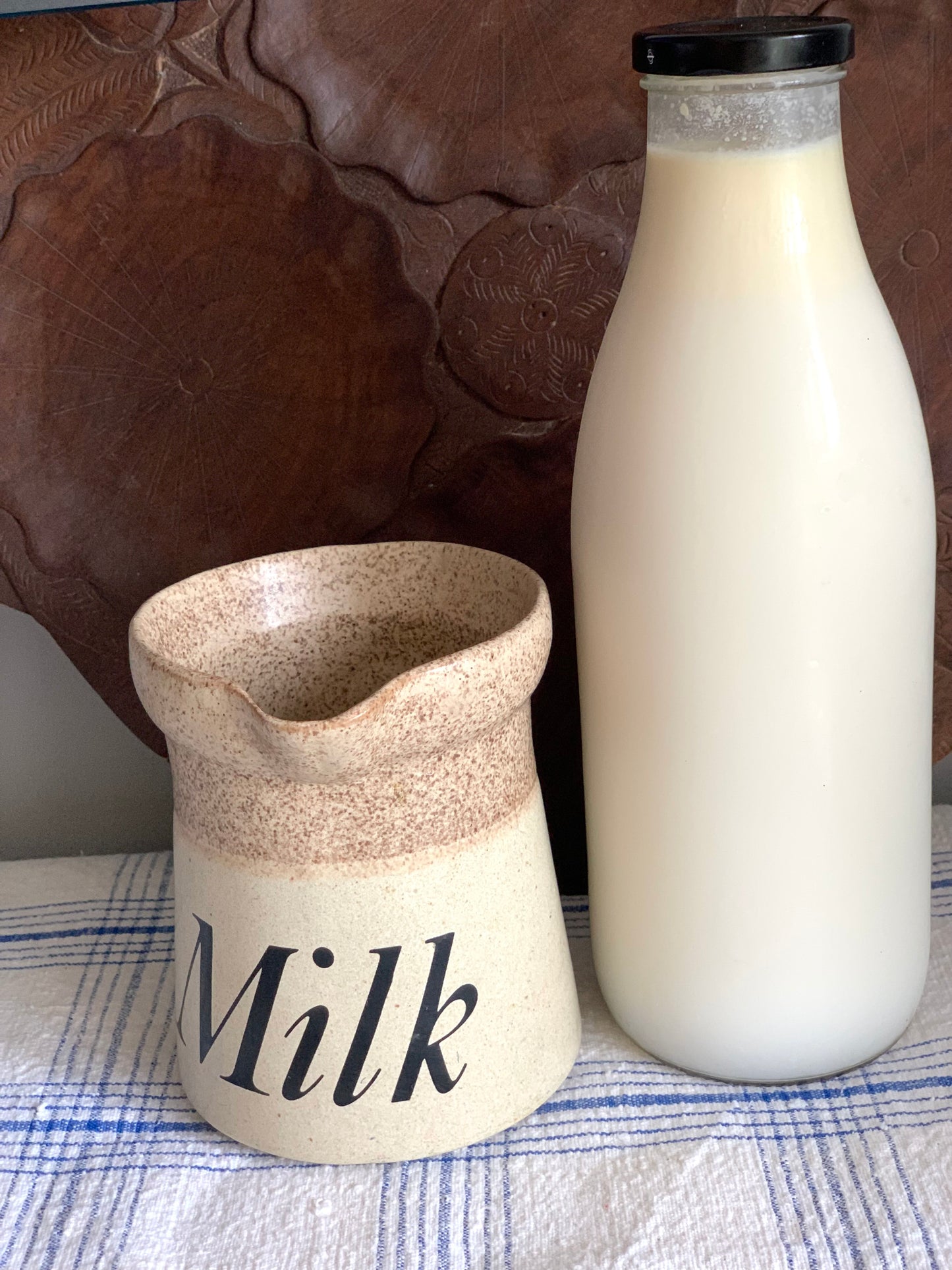 Vintage, handmade, terracotta milk jug.