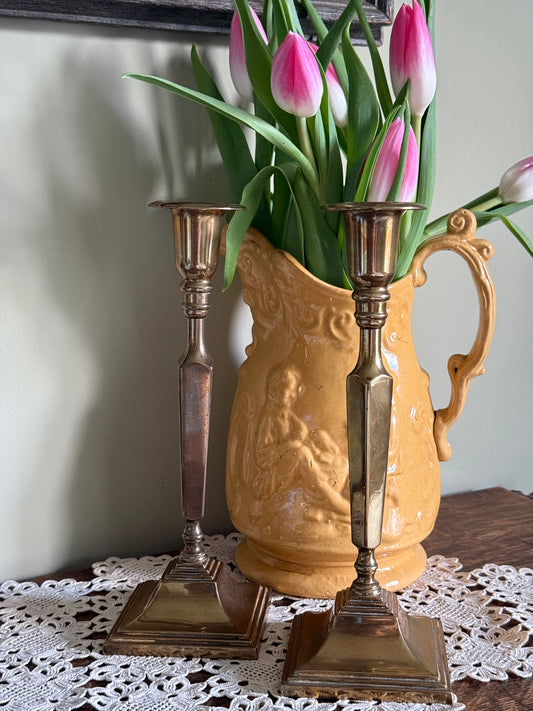 Vintage solid brass candlestick holders.