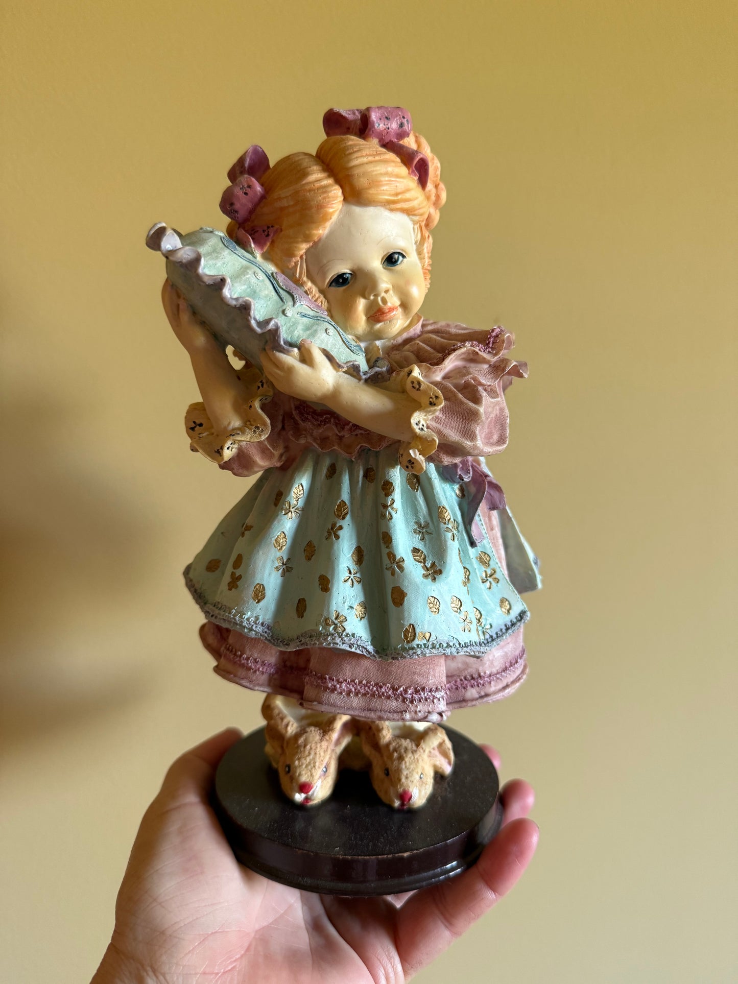 Vintage resin cute girl figurine.