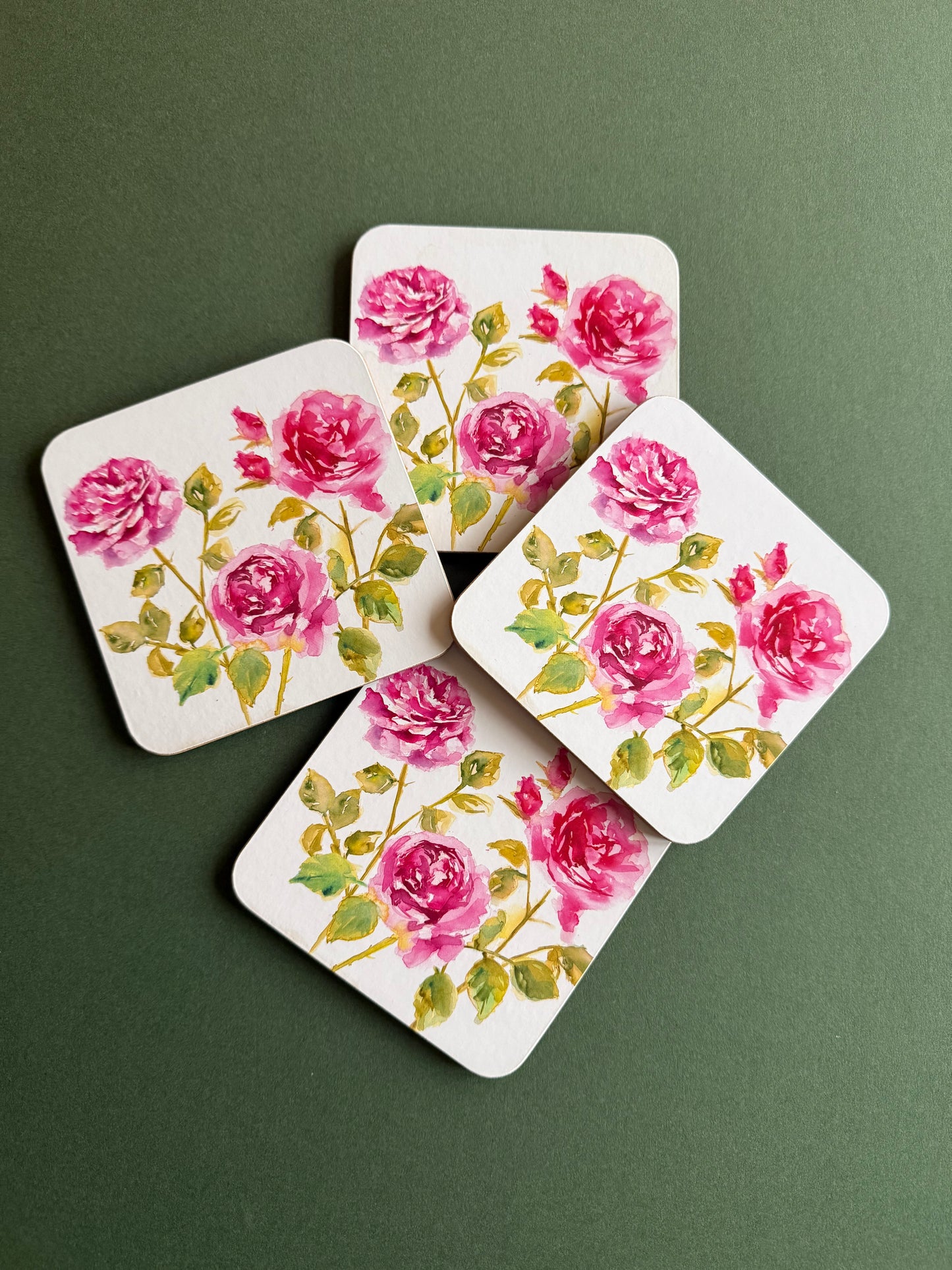 Set of 4 rose coasters.