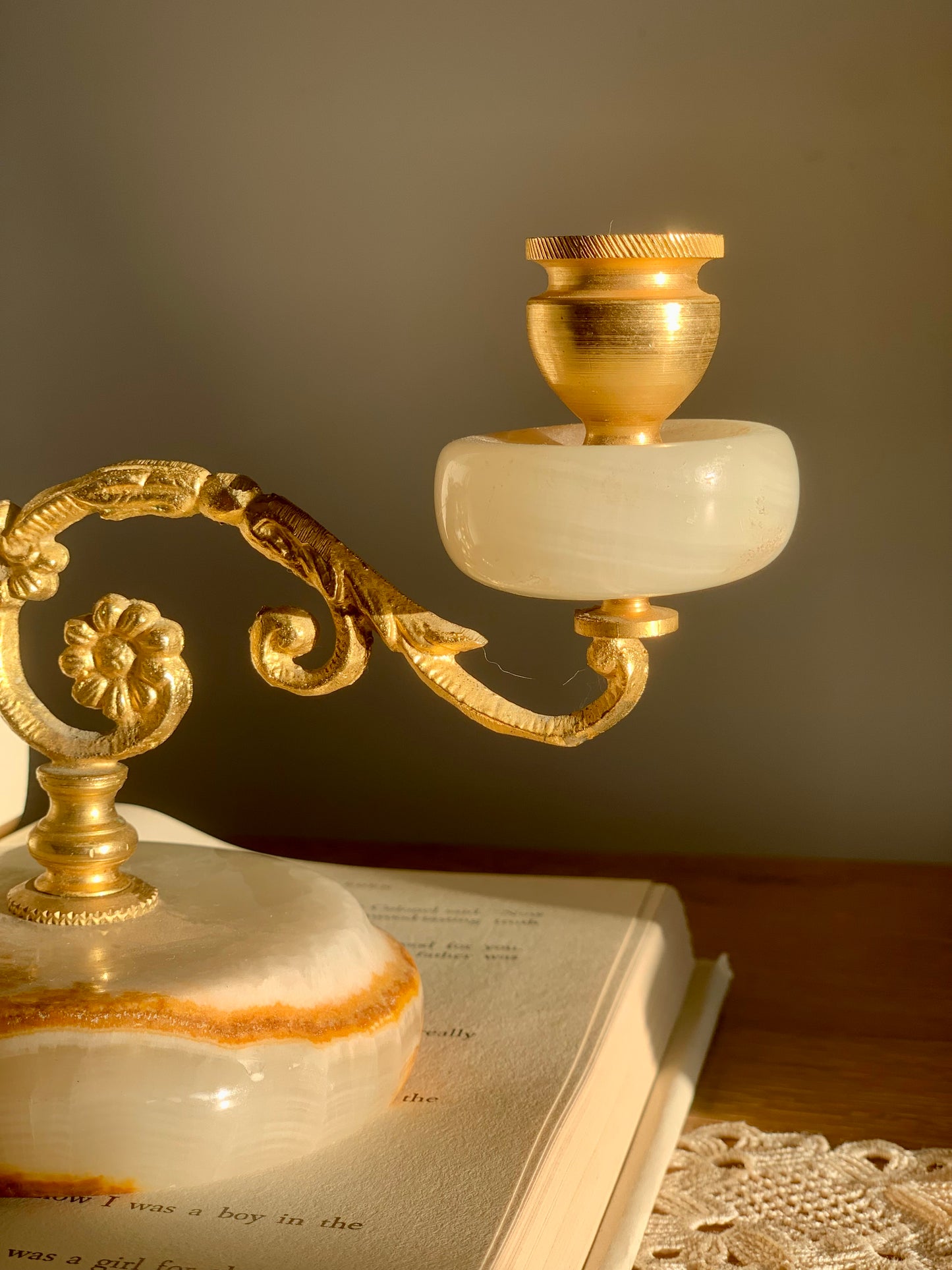 Vintage, onyx and brass candle stick holder.