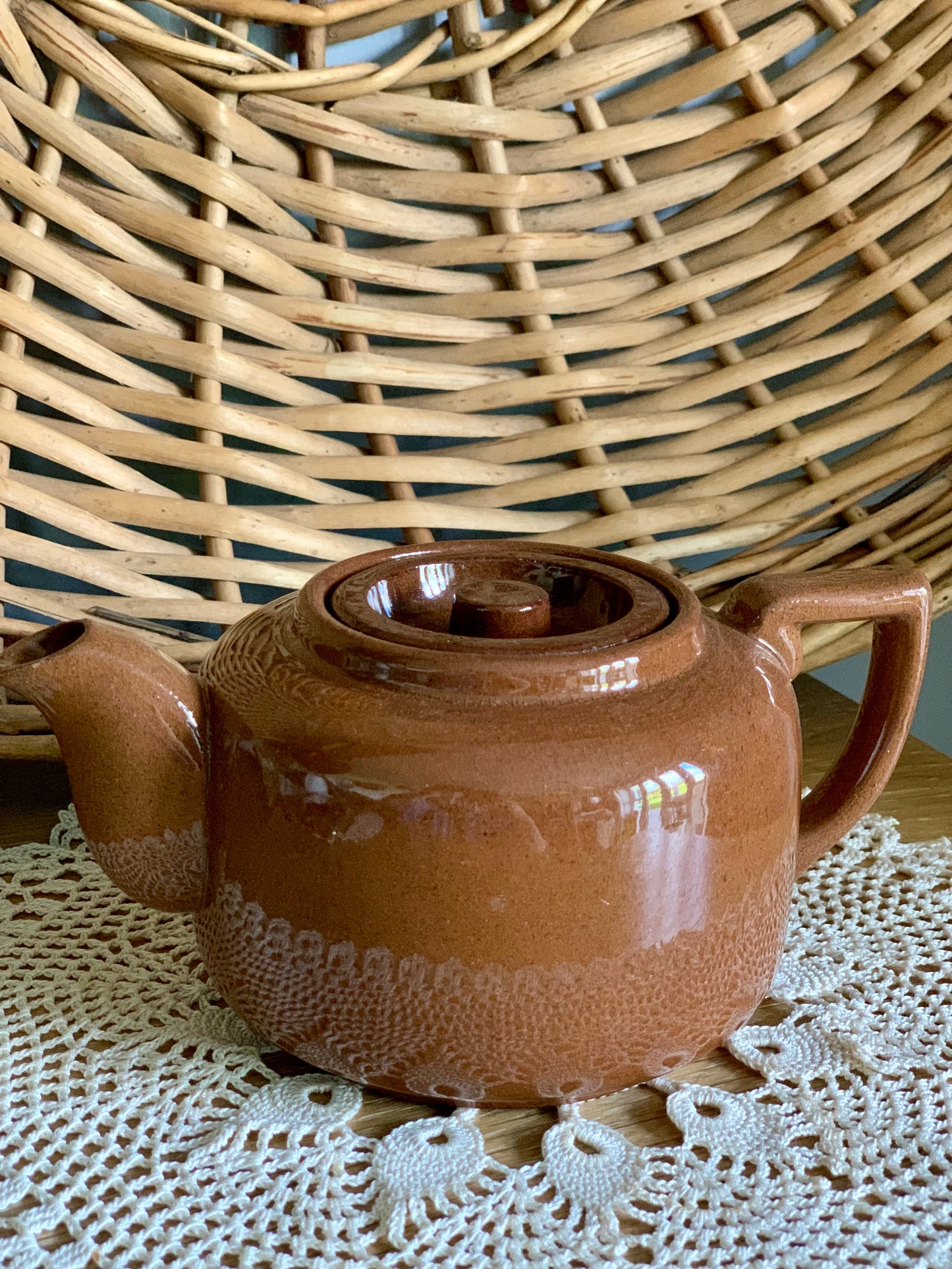 Single, vintage, handmade terracotta teapot.