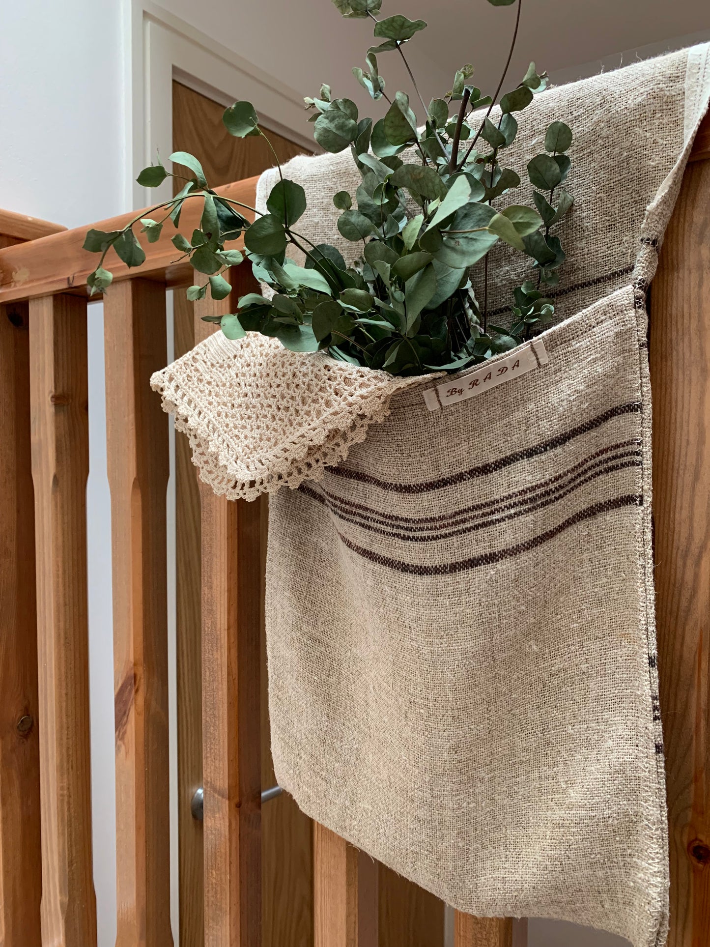 Antique, handwoven hemp stair organiser.