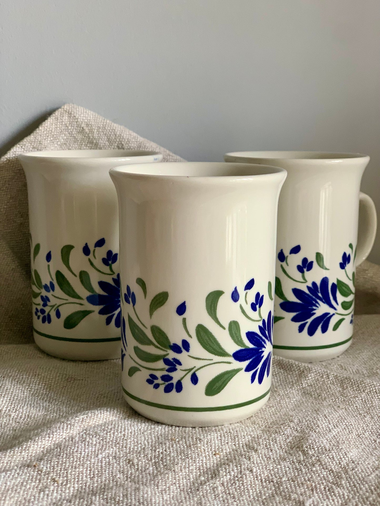 Vintage, hand painted tea mugs.