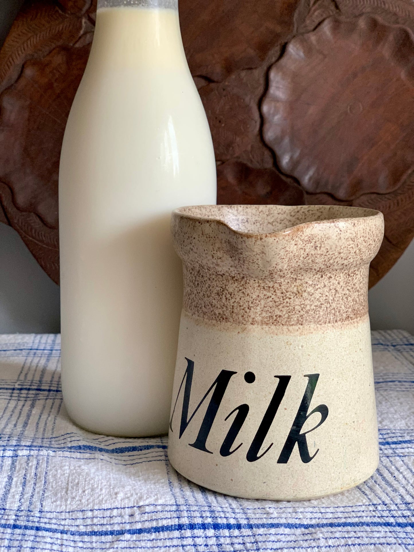 Vintage, handmade, terracotta milk jug.