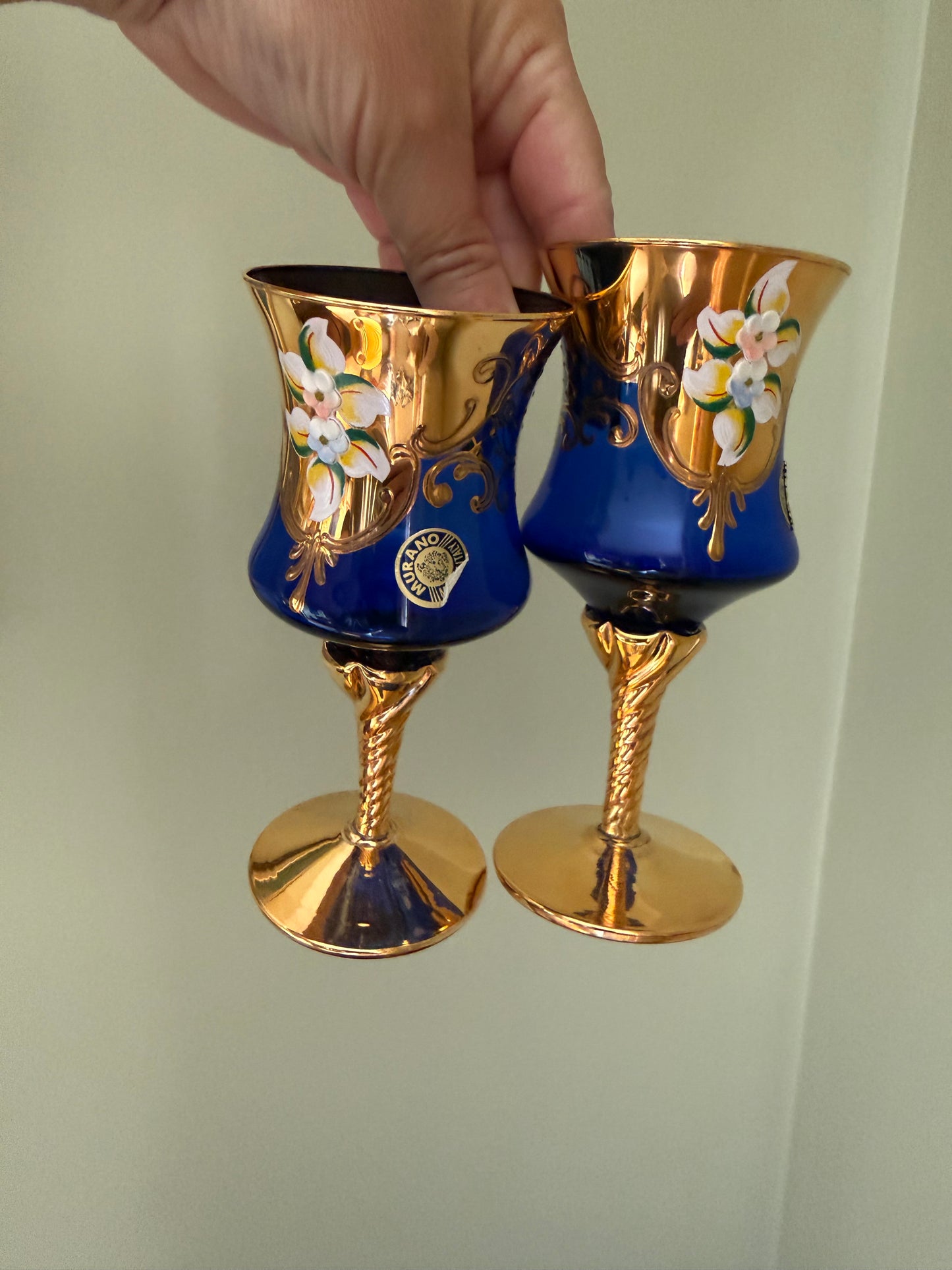 Set of 4 Murano cobalt blue and gold Venetian glass goblets with enamel floral decoration.