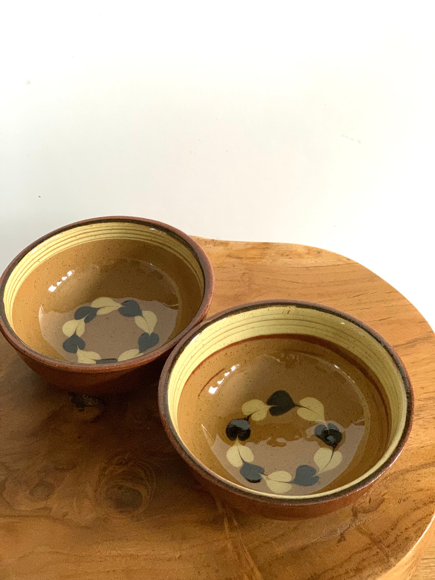 Vintage, set of two, handmade terracotta bowls.