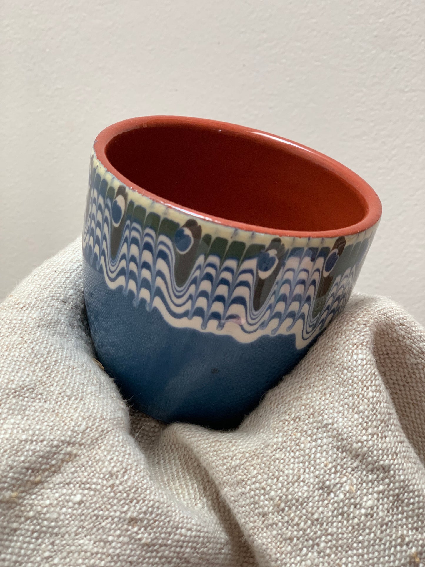 Hand thrown and hand painted, ceramic cups.