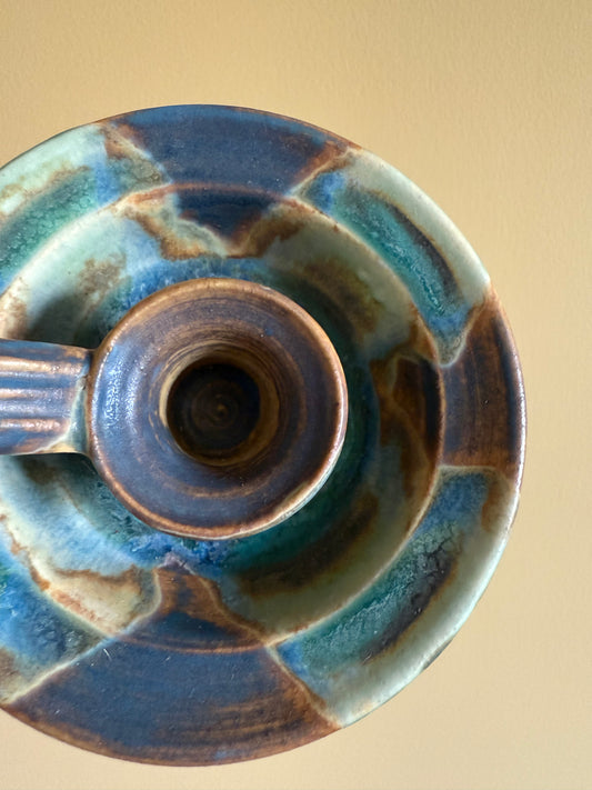Vintage, handmade pottery candlestick holder.
