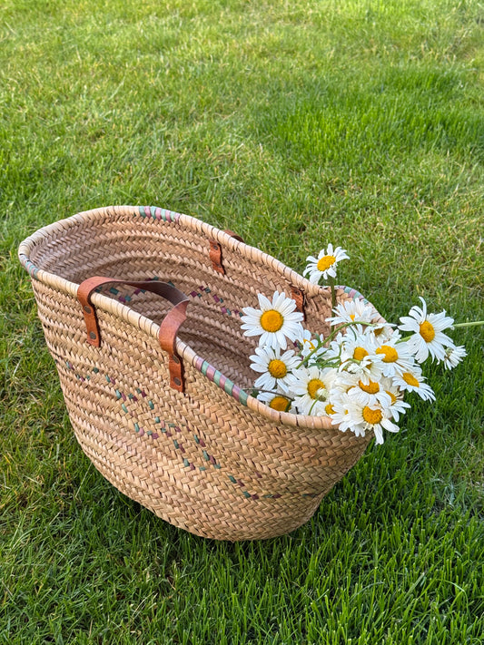 Vintage, genuine leather handles straw basket.