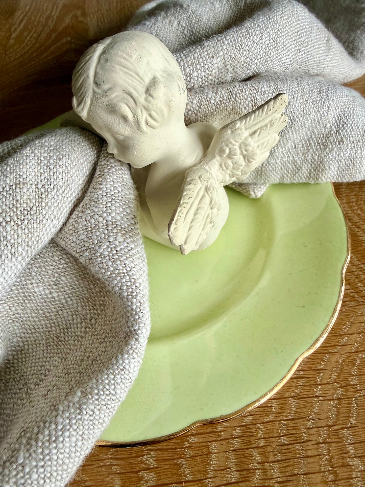 Set of 4 cherub napkin rings.
