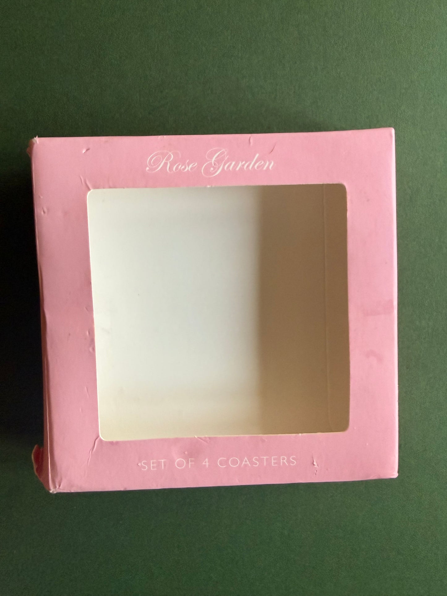 Set of 4 rose coasters.