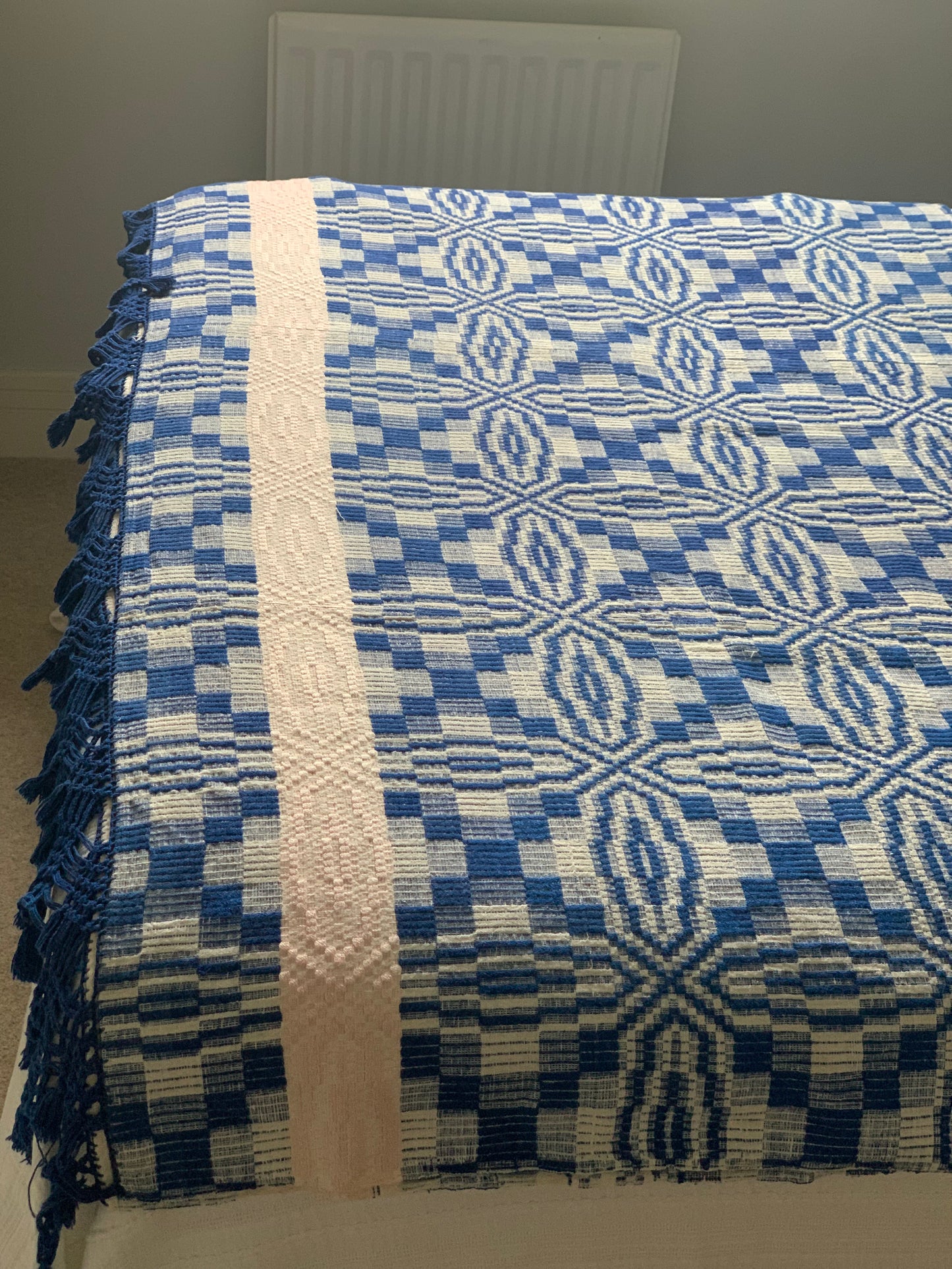 Antique cotton bed throw.