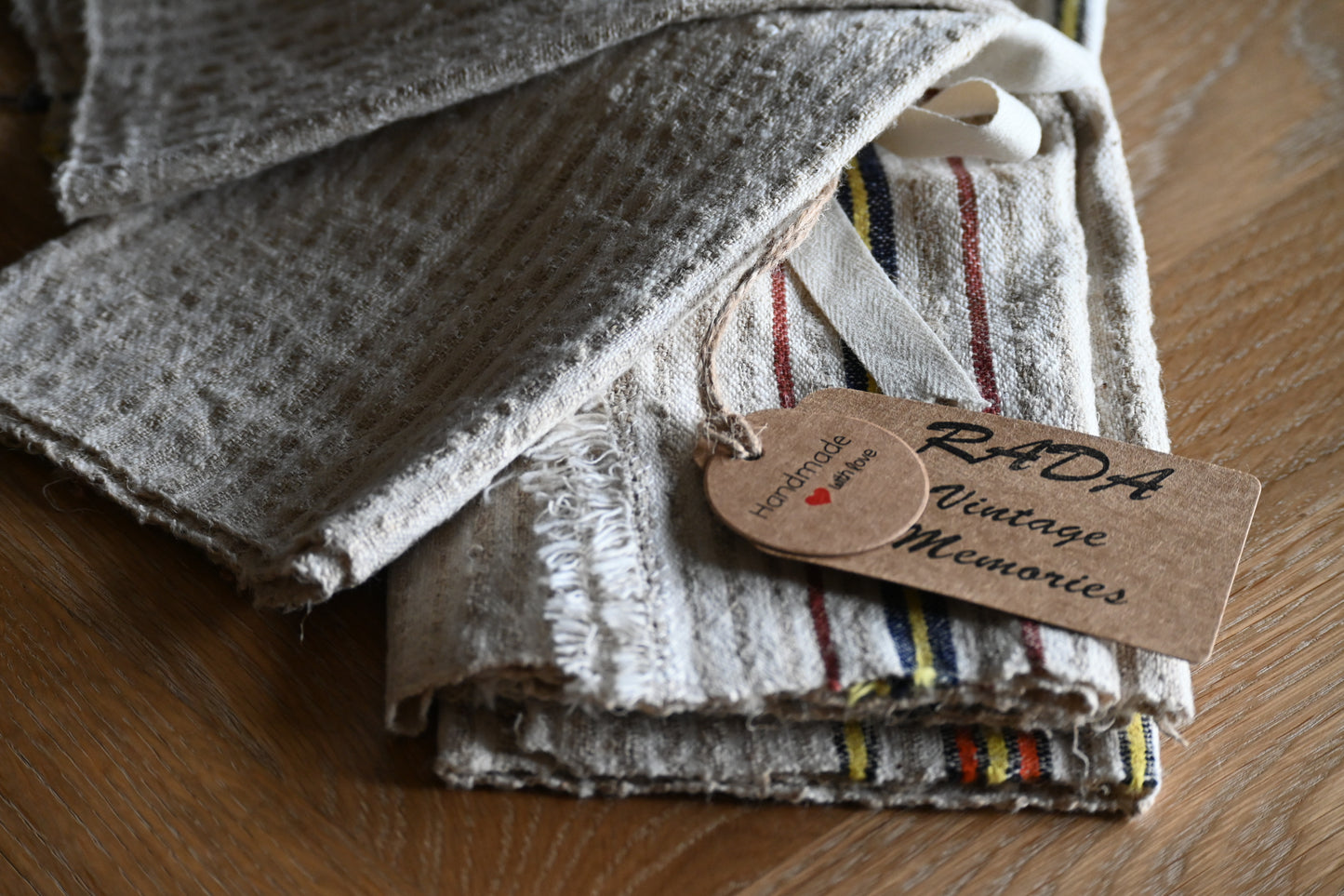 Set of four antique, handwoven place mats.