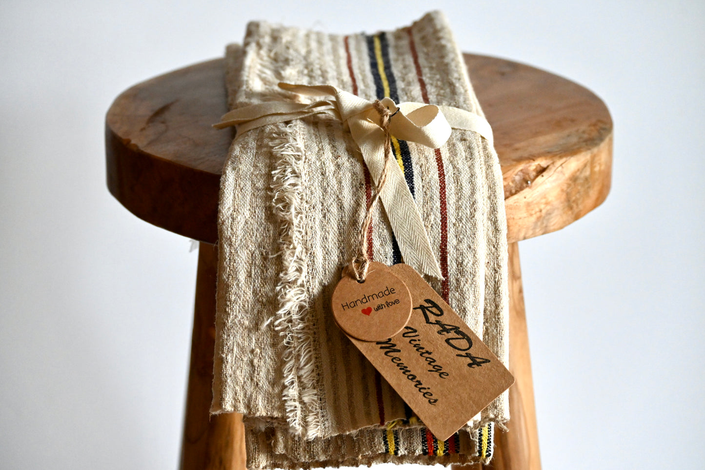 Set of four antique, handwoven place mats.